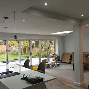 a kitchen and living room are being remodeled